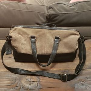Brown sued purse by MO&CO for Sundance